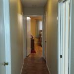 Our painter painted this hallway a neutral color, helping enhance the home, in preparing it for market.